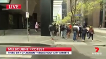 Thumbnail for The absolute state of Australia. Man nearly gets arrested for carrying a protest sign and telling everyone that families are starving. Doughnut eating copper couldn’t catch him though