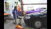 Thumbnail for Jacking Up Car to Change Oil | ExpertVillage Leaf Group