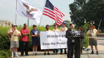 Thumbnail for Gandhi, Mandela, and...Mailmen? Postal Workers Wage Hunger Strike "for Justice"