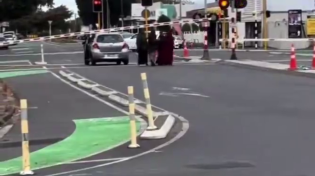 Thumbnail for Muslim ladies leave a car at the train crossing in New Zealand 