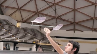 Thumbnail for Indoor hand launched glider world record flight in a dust devil! | joshuawfinn